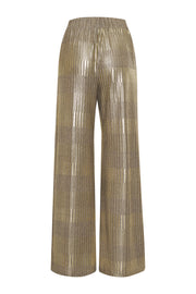Be dressed to impress in our Lamé Wide Leg Pant. Crafted with a high-rise comfort elastic in the back and clean waistband in the front, this pant promises to provide both comfort and style. With its Lamé metallic stripe mixed with Viscose Luxury Knit specialty fabric, this pant is perfect for dressy occasions and can be styled with any of our casual or night out tops for an effortless-styled look. Sparkle wherever you go in our Lamé Wide Leg Pant and feel as comfortable as you are wearing pajama